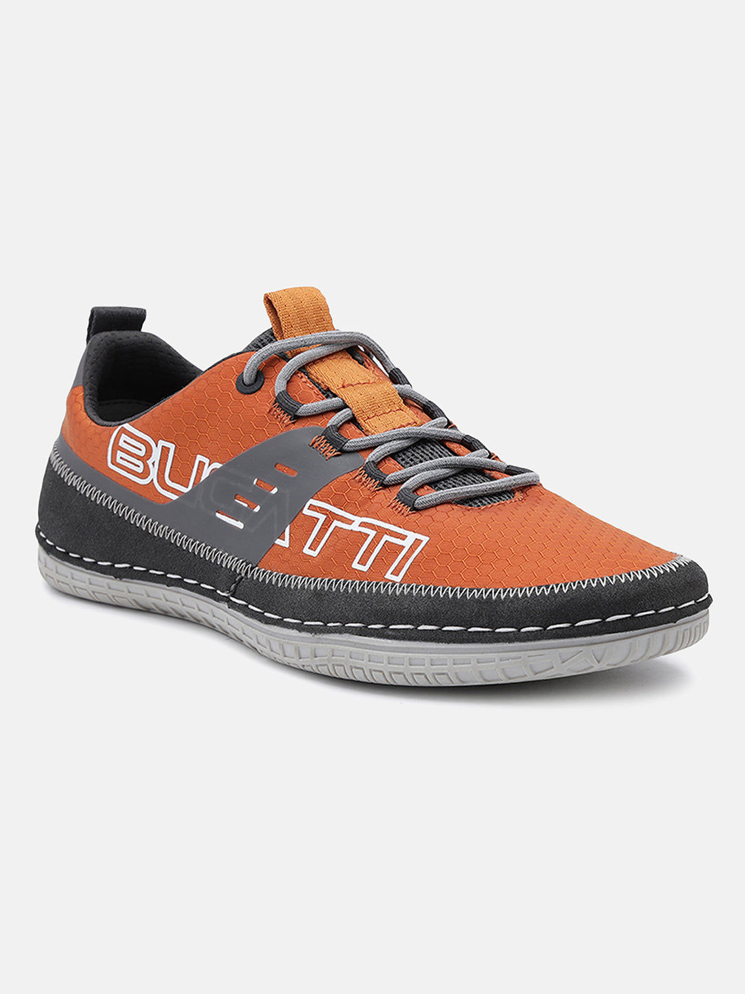 Orange comfort low-top sneakers by bugatti, featuring grey accents, a textured upper, and contrast stitching.