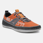 Orange comfort low-top sneakers by bugatti, featuring grey accents, a textured upper, and contrast stitching.