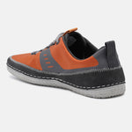 Orange low-top sneaker by Bugatti featuring a honeycomb pattern, gray accents, and white stitching.