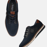 bugatti Sandman casual shoes in dark blue knit, featuring a leather saddle and brown trim.