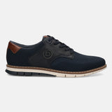 Side view of a bugatti Sandman casual shoe in dark blue with leather accents and a textured knit upper.