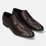 Dark brown leather formal derby shoes by Bugatti, featuring black laces and a subtle, elegant design.
