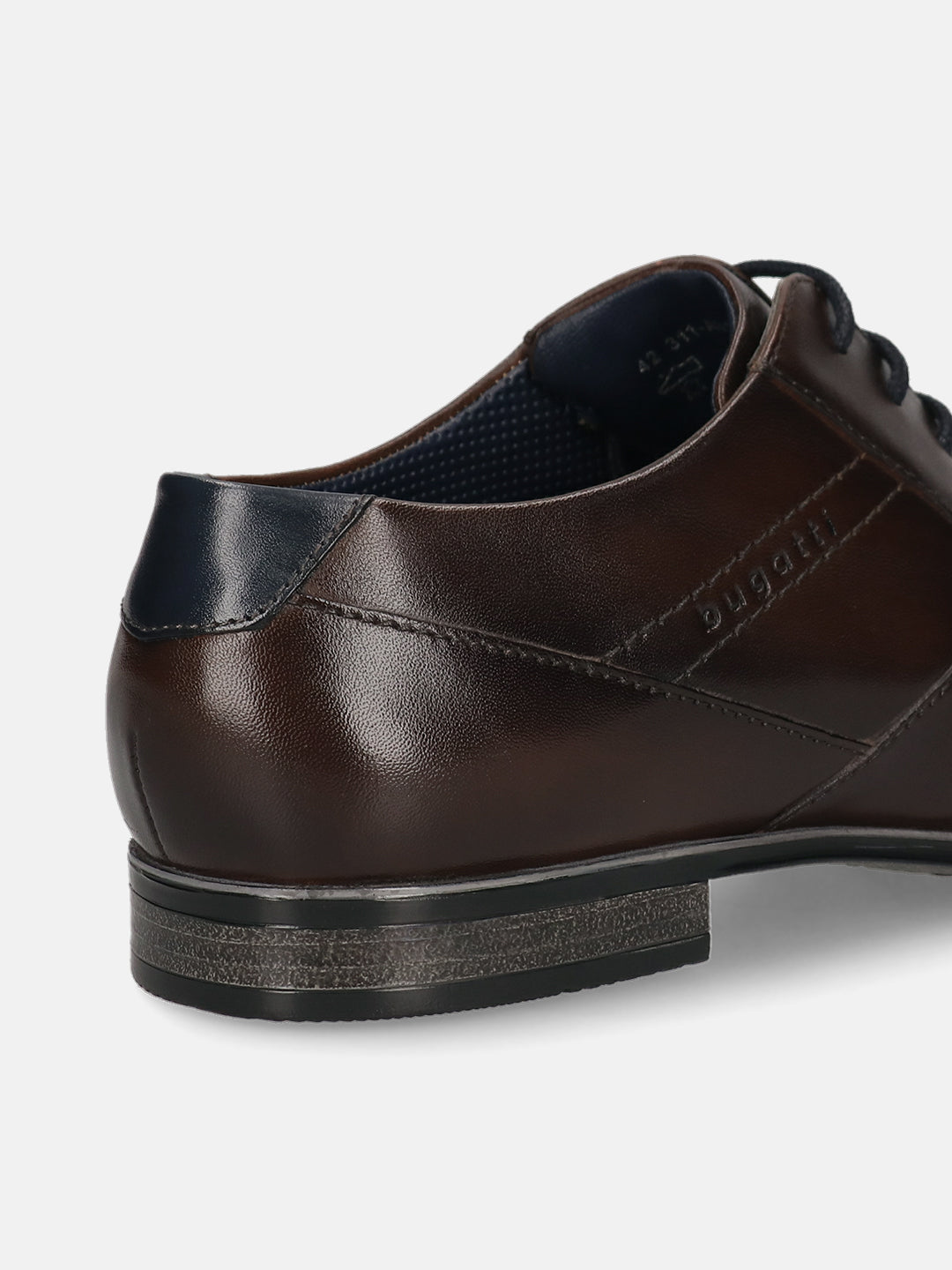 Brown leather derby formal shoe by bugatti with navy heel accent and textured sole, shown in a close-up back angle view.
