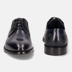Dark blue leather derby shoes by bugatti with a subtle patterned heel.