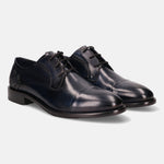 Dark blue leather derby shoes by bugatti with a subtle geometric pattern on the heel.