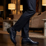 bugatti Livorno Flex Evo dark blue leather derby formal shoes, paired with dark socks and tailored trousers.