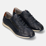bugatti Thorello dark blue leather sneakers with side zip, brown accent at the heel, and lace-up closure.