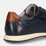 Cropped view of a bugatti Thorello sneaker in dark blue premium leather with a brown heel cap and side zipper.