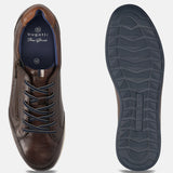 Brown leather comfort sneakers by bugatti, with dark blue laces and sole, shown from above.