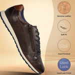 Brown leather comfort sneakers by bugatti with side zipper and contrast blue laces and sole.
