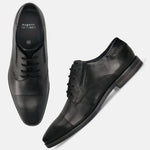 Men's Bugatti derby black leather shoes with a pointed toe and plain toe featuring a moulded heel , a tpr outsole , and laces fastening.