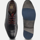 Dark blue premium leather comfort chukka boots by bugatti with a lightly textured detail around the laces.