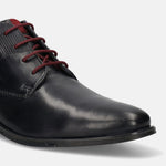 Dark blue leather chukka boot by bugatti with red laces and herringbone fabric on the heel.