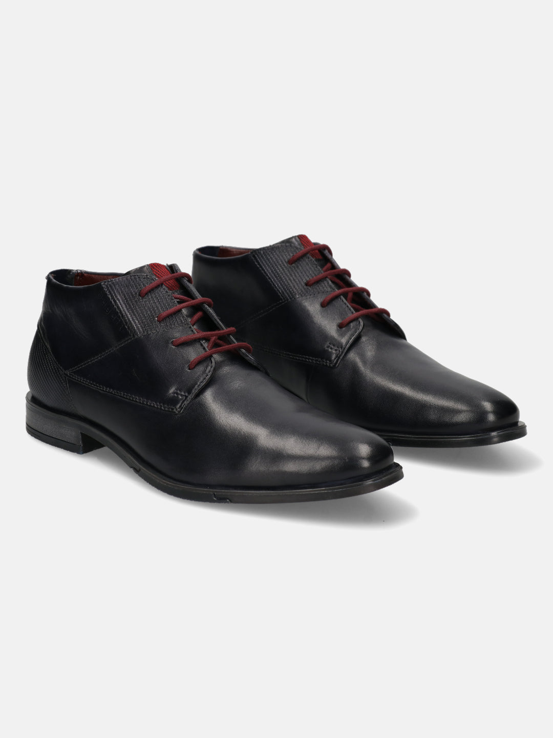 Dark blue leather Chukka boots by bugatti with dark red laces and textured details.