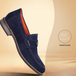 A blue Men's bugatti Penny Loafer featuring a round apron toe, moulded  heel. Made from suede leather with a durable tr outsole, this slip-on design offers both style and comfort.