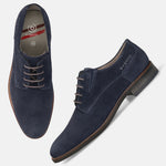 Dark blue leather derby formal shoes by bugatti with micro-perforated texture and brown laces.
