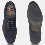 Dark blue suede comfort derby shoes by bugatti with perforated texture and lace-up closure, sole view visible.