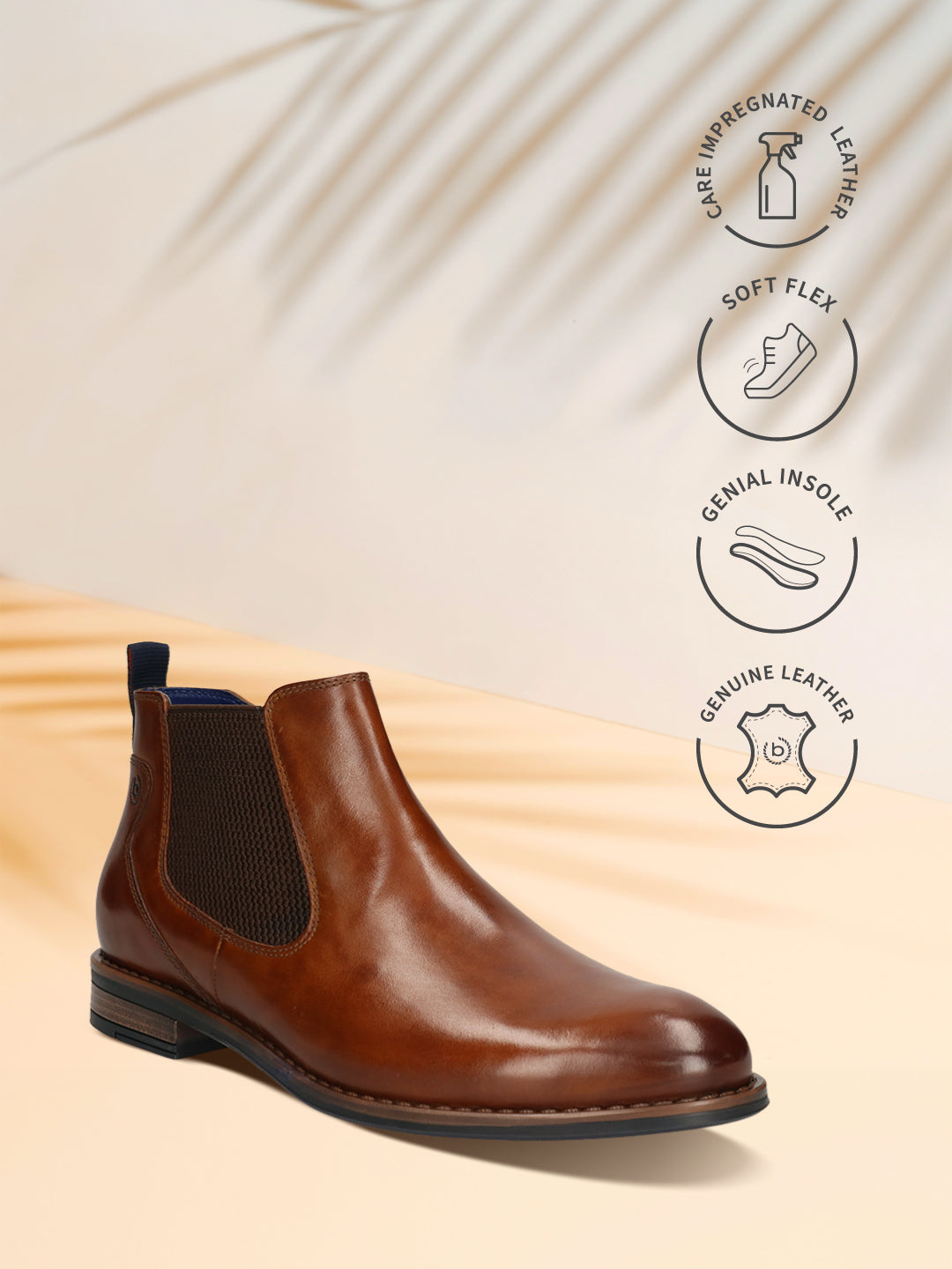 Cognac bugatti Chelsea boot in premium leather, featuring dark brown elastic side panels and a pull tab.
