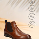 Cognac bugatti Chelsea boot in premium leather, featuring dark brown elastic side panels and a pull tab.
