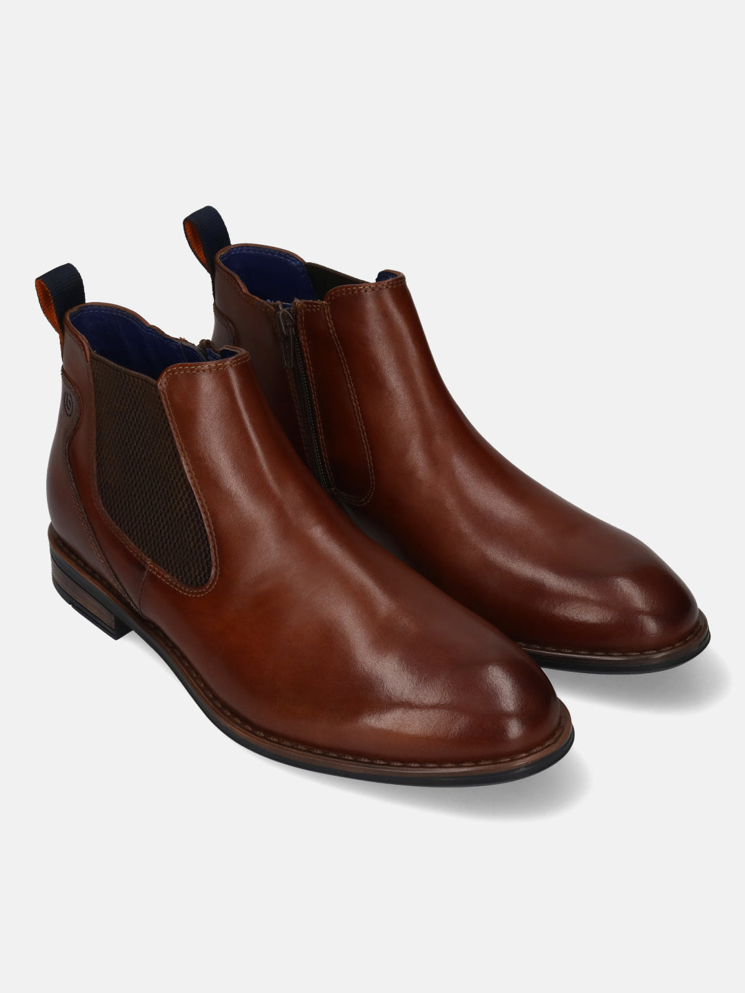 bugatti Amros cognac leather Chelsea boots with blue interior, zipper, and heel pull tab.