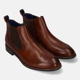 bugatti Amros cognac leather Chelsea boots with blue interior, zipper, and heel pull tab.