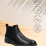 Bugatti Amros black premium leather Chelsea boot with a red heel pull tab, set against a neutral backdrop.