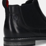 back view of a black bugatti premium leather Chelsea boot, featuring a red-lined pull tab and elastic side panel.
