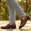 Men's Bugatti penny loafer cognac leather shoes with a pointed toe and apron toe featuring a moulded heel , a tpr outsole.