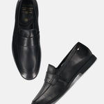 Black leather loafers by bugatti, featuring a penny loafer strap and top stitching.