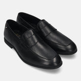 Black leather penny loafers by bugatti with a subtle brand detail on the side and tonal stitching.