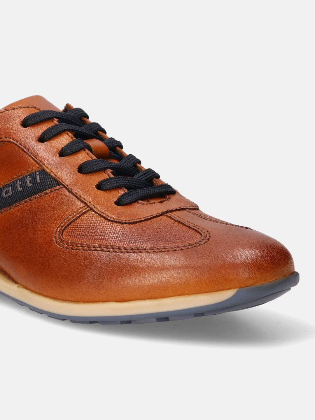 A cognac Men's bugatti Sneakers featuring a round plain toe, zero heels heel. Made from premium genuine leather with a durable tr outsole, this laces design offers both style and comfort.