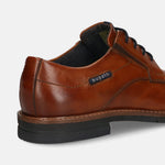 Men's Bugatti derby cognac leather shoes with a round toe and plain toe featuring a stacked heel , a tpr outsole , and laces fastening.