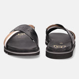 A black Men's bugatti Cross Strap Sandals featuring a round open toe, zero heels heel, and a wide fit. Made from premium genuine leather with a durable eva outsole, this slip-on design offers both style and comfort.