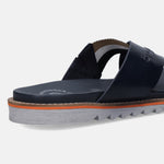 Cropped side view of a dark blue bugatti leather sandal with a comfort cross strap and a ridged sole.
