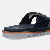 Cropped side view of a dark blue bugatti leather sandal with a comfort cross strap and a ridged sole.
