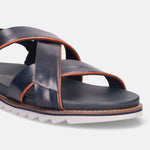 Dark blue leather sandal by bugatti with orange accent stitching, featuring a white sawtooth sole.