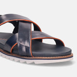 Dark blue leather sandal by bugatti with orange accent stitching, featuring a white sawtooth sole.