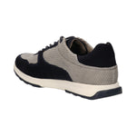 Back view of a bugatti Kensingtone dark blue leather sneaker with grey mesh, a padded collar, and a white midsole.
