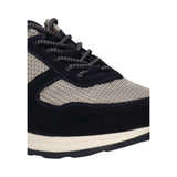 Cropped view of a bugatti Kensingtone sneaker in dark blue suede with a beige mesh insert and patterned laces.