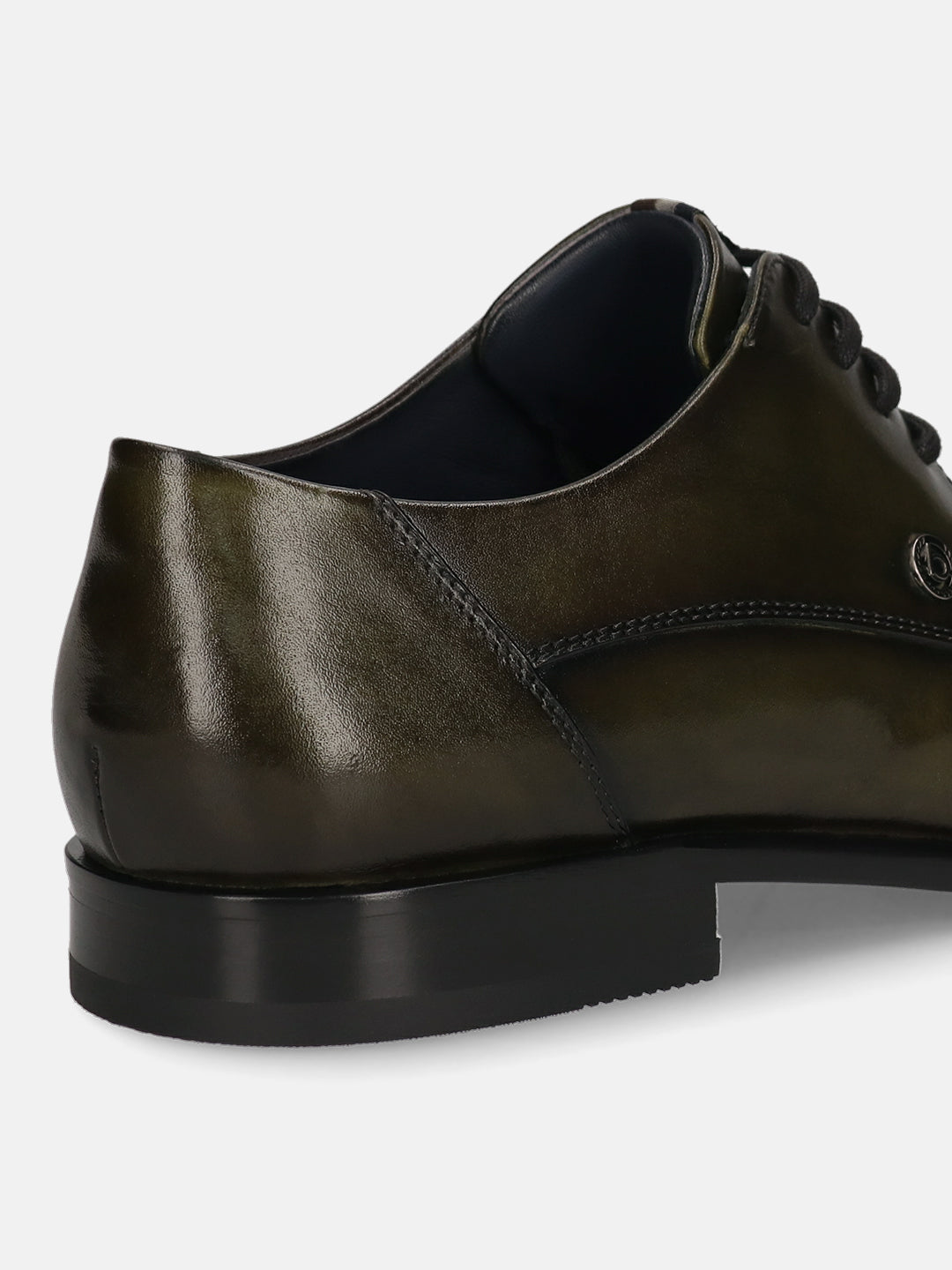 Men's Bugatti derby green leather shoes with a pointed toe and plain toe featuring a stacked heel , a leather outsole , and laces fastening.