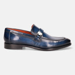 Blue leather penny loafer by bugatti with a silver-toned metal accent.