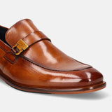 A cognac Men's bugatti Penny Loafer featuring a round plain toe, stacked heel. Made from premium genuine leather with a durable leather outsole, this slip-on design offers both style and comfort.
