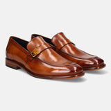 A cognac Men's bugatti Penny Loafer featuring a round plain toe, stacked heel. Made from premium genuine leather with a durable leather outsole, this slip-on design offers both style and comfort.