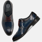 A blue Men's bugatti Derby featuring a round toe wing tip, stacked heel. Made from premium genuine leather with a durable leather outsole, this laces design offers both style and comfort.