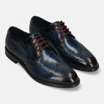 A blue Men's bugatti Derby featuring a round toe wing tip, stacked heel. Made from premium genuine leather with a durable leather outsole, this laces design offers both style and comfort.