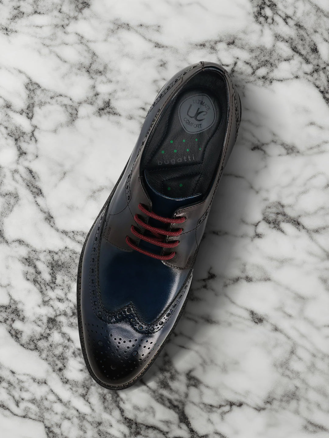 A blue Men's bugatti Derby featuring a round toe wing tip, stacked heel. Made from premium genuine leather with a durable leather outsole, this laces design offers both style and comfort.