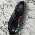 A blue Men's bugatti Derby featuring a round toe wing tip, stacked heel. Made from premium genuine leather with a durable leather outsole, this laces design offers both style and comfort.