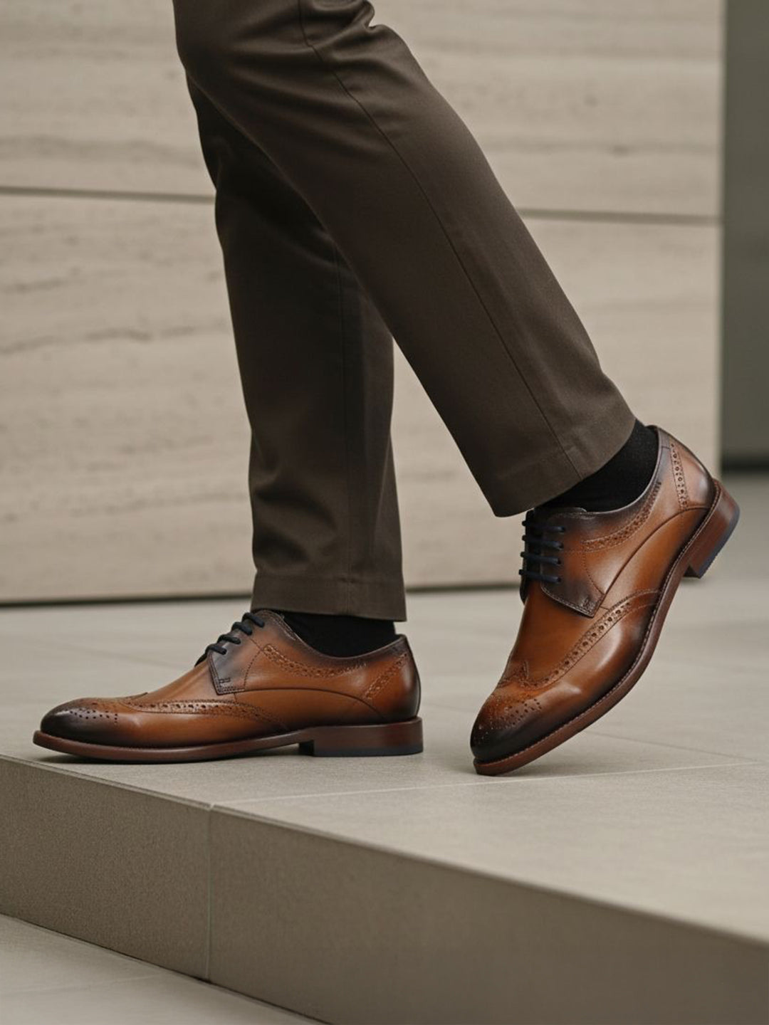 bugatti Livorno Flex Evo cognac leather formal shoes, visible with dark socks and dress pants.
