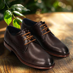 A brown Men's bugatti Derby featuring a round toe plain toe, stacked heel. Made from premium genuine leather with a durable leather outsole, this laces design offers both style and comfort.