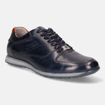 Dark blue leather sneaker by bugatti with brown heel detail and patterned laces.